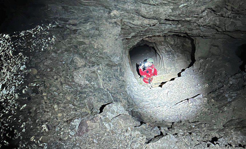 A U.S. Airman assigned to the 48th Rescue Squadron rope repels into a mineshaft, Yuma, Ariz., April 7, 2024. The 563rd Rescue Group coordinated efforts to save a woman who fell down 200 feet into a mineshaft. (Courtesy photo)