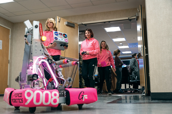 Members of G-Force, a Department of Defense sponsored all girl’s robotics team, demo one of their robotsafter a discussion with the International Visitor Leadership Program at the Pentagon, Washington, D.C., Jan 23, 2023. (DoD photo by U.S. Air Force Tech. Sgt. Jack Sanders)