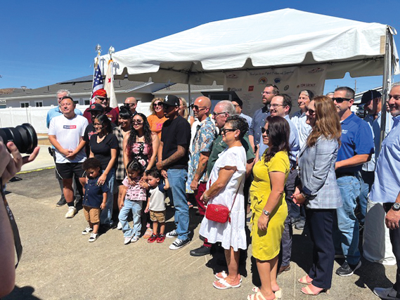 Members of the public and local veterans were on hand when Marine veteran Tony Tortolano received the keys to his new home in the Veterans Enriched Neighborhood. (Photos by Dennis Anderson)