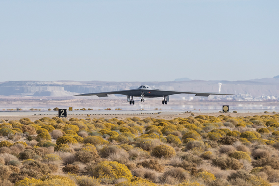 A B-21 Raider conducts flight testing, which includes ground testing, taxiing and flying operations, at Edwards Air Force Base, Calif. The B-21 will be the backbone of the service’s future bomber force, and will possess the range, access and payload to penetrate the most highly-contested threat environments and hold any target around the globe at risk. The bomber platform is being developed through the Department of the Air Force Rapid Capabilities Office, which utilizes streamlined methods to develop, produce and field critical combat capabilities. (Air Force photograph)