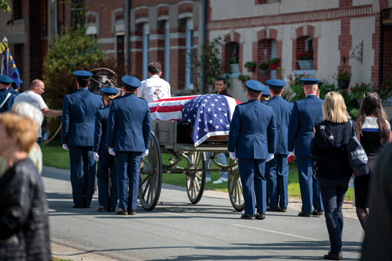 Airmen from the 94th Fighter Squadron escort the remains of Capt. Hamilton Coolidge to his final resting area during a reinterment ceremony in Chevières, France, Sept. 15, 2024. The ceremony included military honors for Coolidge, who served as a fighter pilot and flight lead with the 94th Aero Squadron in World War I. The 94th FS is currently based at Joint Base Langley–Eustis, Va. (Air Force photographs by Airman 1st Class Albert Morel)