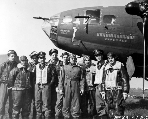 The crew of the B-17 Flying Fortress “Memphis Belle” is shown at an air base in England after completing 25 missions over enemy territory on June 7, 1943. They are, left to right: Tech. Sgt. Harold P. Loch of Green Bay, Wisc., top turret gunner; Staff Sgt. Cecil H. Scott of Altoona, Penn., ball turret gunner; Tech. Sgt. Robert J, Hanson of Walla Walla, Wash., radio operator; Capt. James A. Verinis, New Haven, Conn., co-pilot; Capt. Robert K. Morgan of Asheville, N.C., pilot; Capt. Charles B. Leighton of Lansing, Mich., navigator; Staff Sgt. John P. Quinlan of Yonkers, N. Y., tail gunner; Staff Sgt. Casimer A. Nastal of Detroit, Mich., waist gunner; Capt. Vincent B. Evans of Henderson, Texas, bombardier and Staff Sgt. Clarence E. Winchell of Oak Park, Ill., waist gunner. (Air Force photograph)