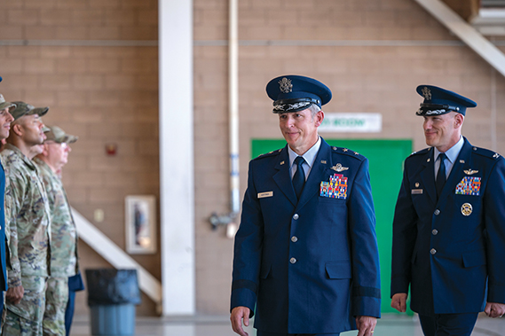 U.S. Air Force Maj. Gen. Justin Hoffman, left, Air Force Special Operations Command deputy commander, and Col. Brett Cassidy, right, 11th Air Task Force commander, depart the 11th ATF activation and assumption of command ceremony at Davis-Monthan Air Force Base, Arizona, Oct. 8, 2024. The 11th ATF will serve as one of six of the Air Force’s units of action available to meet global combatant command requirements. (U.S. Air Force photo by Airman 1st Class Jasmyne Bridgers-Matos)