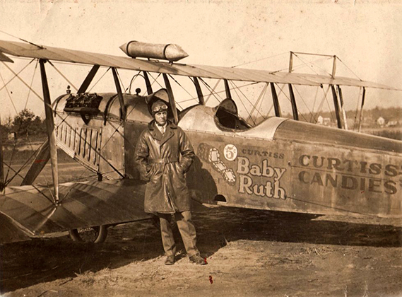 Doug Davies with his very first Baby Ruth Bomber, an old surplus World War I Jenny . Not long after he purchased three WACO biplanes to create his Flying Circus. (Courtesy photo)