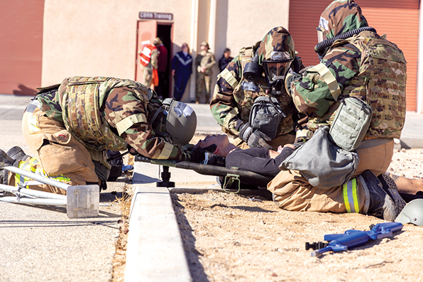 Dec. 3-9: Edwards AFB, Calif. — The 412th Test Wing conducted the largest combat readiness exercise in Air Force Materiel Command corporate memory Dec. 3 to 6, and followed up with a full-day community partner tabletop readiness exercise on Dec. 9 at Edwards. The exercise and associated inspection tested Edwards’ and Plant 42’s response to a range of simulated security threats and operational challenges in this age of great power competition. Events began with a mid-morning alert to base leadership simulating an increase in the threat level to the base, prompting the exercise to elevate to Force Protection Condition Charlie. This was followed by a simulated explosion at the base’s west gate, escalating the situation to FPCON Delta within the exercise space — indicating a heightened risk of ongoing or complex attacks on base people, facilities and assets. (Air Force photograph by Daniel Kelley)