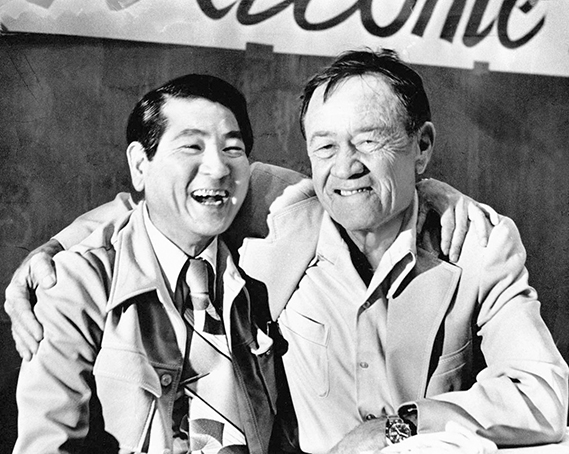 World War II fighter pilots Masajiro “Mike” Kawato and Greg “Pappy” Boyington share a moment. (Courtesy photograph)